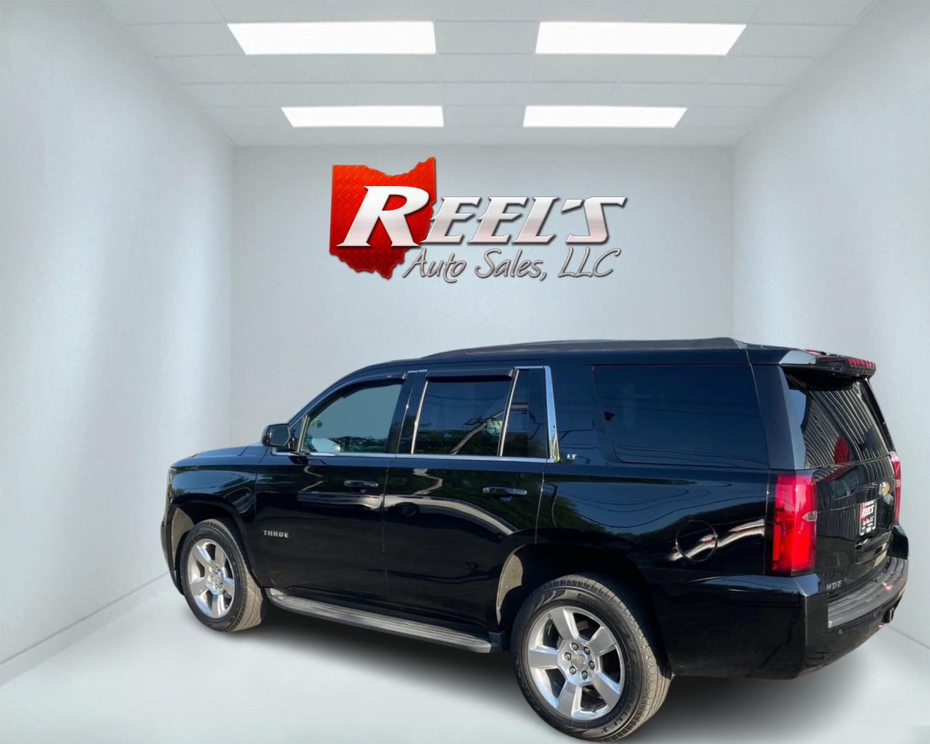 2015 Black /Gray Chevrolet Tahoe LT 4WD (1GNSKBKC4FR) with an 5.3L V8 OHV 16V engine, 6-Speed Automatic transmission, located at 547 E. Main St., Orwell, OH, 44076, (440) 437-5893, 41.535435, -80.847855 - Photo#8